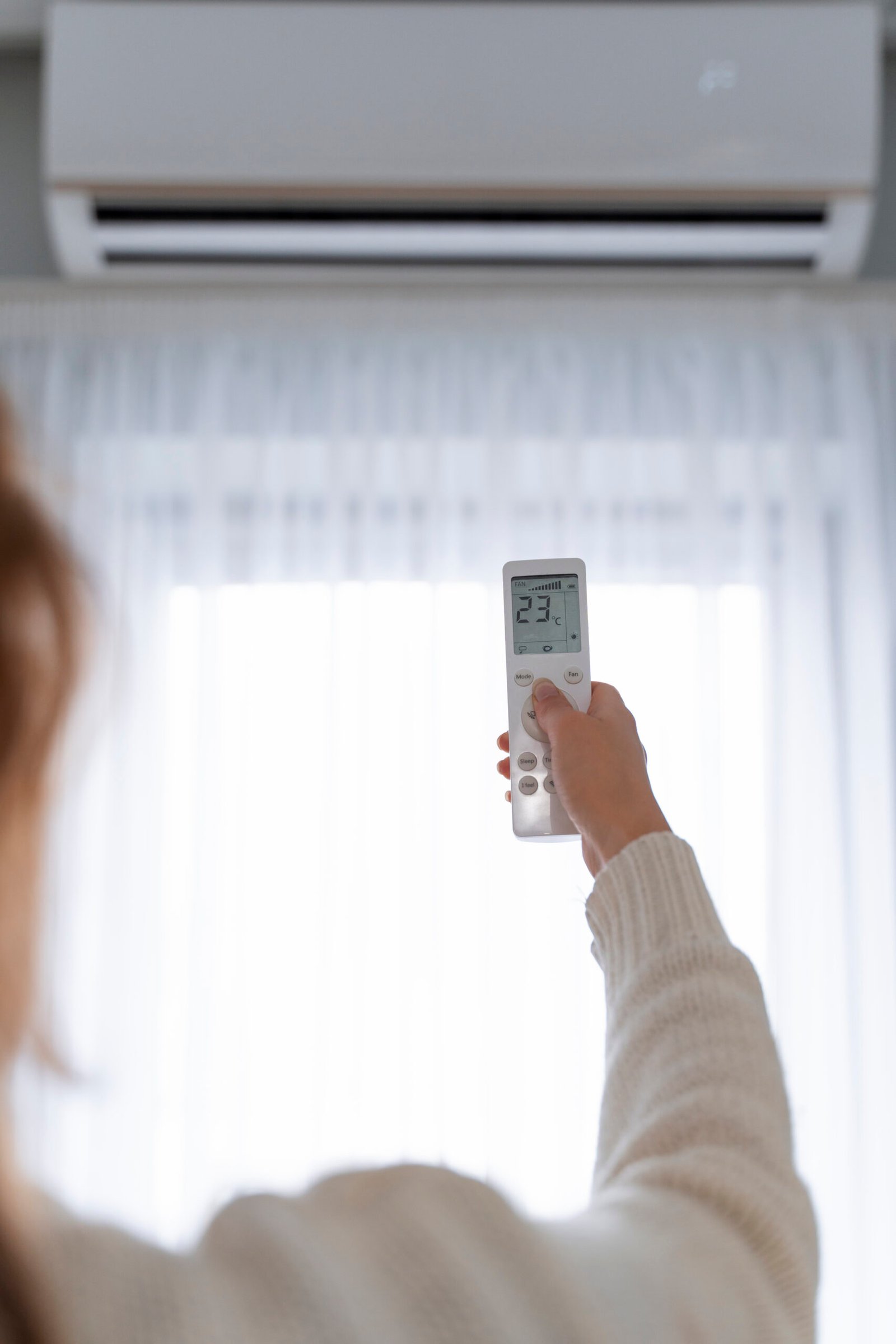 woman-holding-remote-start-heater